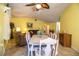 Inviting dining room with a six-chair dining table, tiled floor and decor at 4976 Pleasant Hollow Trl, Lakeland, FL 33811