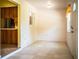 Inviting entryway features neutral tile flooring, a view into the kitchen, and ample natural light at 4976 Pleasant Hollow Trl, Lakeland, FL 33811