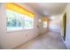 Bright hallway with tile floor and door at 4976 Pleasant Hollow Trl, Lakeland, FL 33811