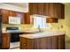 Functional kitchen featuring updated appliances and ample counter space at 4976 Pleasant Hollow Trl, Lakeland, FL 33811