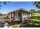 Convenient community mailbox structure with brick columns and white trim, set amongst lush landscaping at 4976 Pleasant Hollow Trl, Lakeland, FL 33811