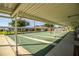 Well-maintained shuffleboard courts with multiple lanes, surrounded by landscaped grounds for enjoyable outdoor activities at 4976 Pleasant Hollow Trl, Lakeland, FL 33811