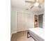 Bedroom features neutral walls, vinyl floors, double closets, and great natural light at 502 Duchess Dr, Lakeland, FL 33803