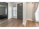 Inviting foyer with wood flooring, stylish front door with sidelight, and access to the rest of the home at 502 Duchess Dr, Lakeland, FL 33803