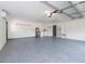 Garage features an epoxy floor, laundry, and room for two cars and storage at 502 Duchess Dr, Lakeland, FL 33803