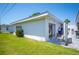 Lush backyard with a small patio area, perfect for outdoor relaxation at 512 Cameo Dr, Lakeland, FL 33803