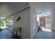View of the carport with storage, and a glimpse of the neighborhood at 512 Cameo Dr, Lakeland, FL 33803