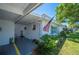 Inviting front entrance with charming decor and an American flag at 512 Cameo Dr, Lakeland, FL 33803