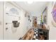 Hallway with checkered tile, leading to living area at 512 Cameo Dr, Lakeland, FL 33803