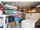 Ample storage room includes shelving units and washer dryer hook-ups at 512 Cameo Dr, Lakeland, FL 33803