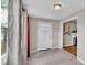 Inviting entryway with patterned floors, neutral walls, and white trim at 523 W Hancock St, Lakeland, FL 33803