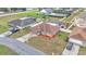 Lovely single-story home featuring a spacious front yard, inviting curb appeal, and a private screened-in pool at 5246 Montserrat Dr, Lakeland, FL 33812