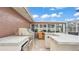 View of outdoor kitchen offering stainless steel appliances, grill, granite counters and cabinet storage for backyard entertaining at 5246 Montserrat Dr, Lakeland, FL 33812