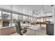 Spacious sunroom converted to an office with great natural light and views of the private pool at 5246 Montserrat Dr, Lakeland, FL 33812