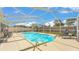Enjoy a refreshing dip in this screened-in pool and relaxing on the patio furniture at 5246 Montserrat Dr, Lakeland, FL 33812