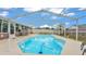 Enjoy this refreshing screened-in pool with an attached sunroom and a private fenced-in yard at 5246 Montserrat Dr, Lakeland, FL 33812