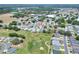 This aerial view highlights the home's location near the golf course at 525 Eagle Run, Lakeland, FL 33809