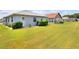 This backyard is spacious and has nice landscaping at 525 Eagle Run, Lakeland, FL 33809