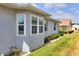 This charming home features well maintained landscaping and large windows at 525 Eagle Run, Lakeland, FL 33809