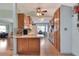 Spacious kitchen with wooden cabinets, updated appliances, tile floors and an island with seating at 525 Eagle Run, Lakeland, FL 33809