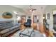 Inviting living room with hardwood floors, comfortable seating, and an open layout perfect for entertaining at 525 Eagle Run, Lakeland, FL 33809