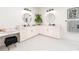 Elegant bathroom with dual sinks, stylish mirrors, and modern black and white tile flooring at 527 W Park St, Lakeland, FL 33803