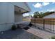 Exterior view shows the front porch, steps, walkway and fencing at 527 W Park St, Lakeland, FL 33803