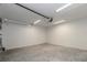 Spacious two-car garage with high ceilings and electric door opener at 527 W Park St, Lakeland, FL 33803