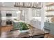 Modern kitchen features stainless steel appliances, island, and a view to the dining room at 527 W Park St, Lakeland, FL 33803