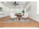 Bright and airy living room with hardwood floors, a ceiling fan, and stylish furniture at 527 W Park St, Lakeland, FL 33803