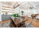 Open floor plan showcasing the kitchen, dining, and living areas with natural light and hardwood flooring at 527 W Park St, Lakeland, FL 33803