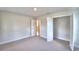 Bright bedroom with spacious closet and access to other rooms at 580 Jett Ln, Davenport, FL 33837