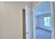 Bedroom features a walk-in closet and natural light at 580 Jett Ln, Davenport, FL 33837