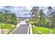 Neighborhood bridge showing the paved path with stone pillars for the Horse Creek at Crosswinds community at 580 Jett Ln, Davenport, FL 33837