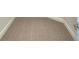 Neutral carpeted hallway with white baseboards at 580 Jett Ln, Davenport, FL 33837