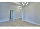 This living room features recessed lighting and stylish tile flooring at 580 Jett Ln, Davenport, FL 33837