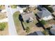 This aerial shot features a cozy single Gathering home with a fenced-in yard and manicured lawn at 633 Heather Glen Loop, Winter Haven, FL 33884