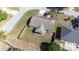Aerial view of the backyard with wood fence and screened lanai at 633 Heather Glen Loop, Winter Haven, FL 33884