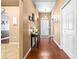 Well-lit foyer featuring hardwood floors, neutral walls, and a view of connecting rooms at 633 Heather Glen Loop, Winter Haven, FL 33884