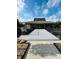 Attractive community clubhouse with a lakeside view and well-maintained grounds at 668 Jamaica Cir, Lakeland, FL 33803
