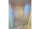 Walk-in shower with a glass door, safety bars, and accessible design for easy use at 668 Jamaica Cir, Lakeland, FL 33803