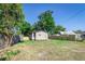 A spacious backyard with a mixed wooden fence offers a private outdoor retreat at 737 Johnson Ave, Lakeland, FL 33801