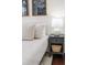 Cozy bedroom featuring a comfortable bed, nightstand with storage, and soft lighting at 737 Johnson Ave, Lakeland, FL 33801