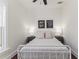 Well-lit bedroom with metal bed frame and coordinated bedside tables and lamps at 737 Johnson Ave, Lakeland, FL 33801