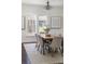 Dining room features a chandelier, large window, and an open dining space at 737 Johnson Ave, Lakeland, FL 33801
