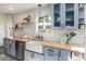 Kitchen with open shelving, subway tile backsplash, and butcher block countertops at 737 Johnson Ave, Lakeland, FL 33801