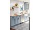 Kitchen with floating shelves, farmhouse sink, butcher block counters, and modern tile at 737 Johnson Ave, Lakeland, FL 33801