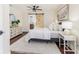 Relaxing main bedroom with a sliding barn door that leads to the en-suite bathroom at 737 Johnson Ave, Lakeland, FL 33801