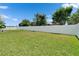 Large, well-maintained backyard with a privacy fence, offering ample space for recreation at 7890 Ashford Dr, Lakeland, FL 33810