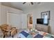 Bedroom with a large closet and a neutral color scheme, creating a serene and relaxing atmosphere at 7890 Ashford Dr, Lakeland, FL 33810